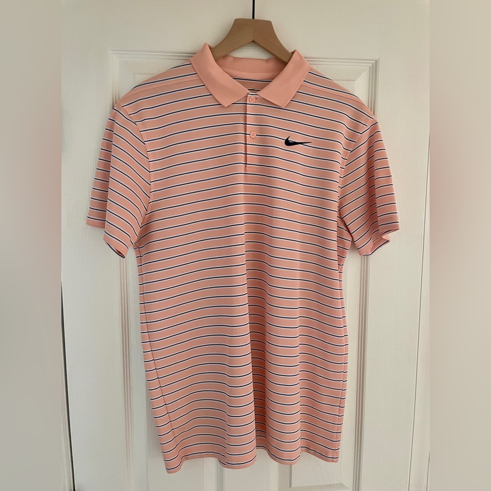 Nike Dri-Fit Polo. Men's Size M. Coral peach, navy blue stripes.